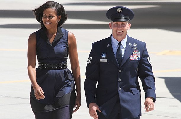 michelle obama Dressed in a navy frock