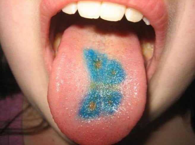 Butterfly Tongue Tattoo