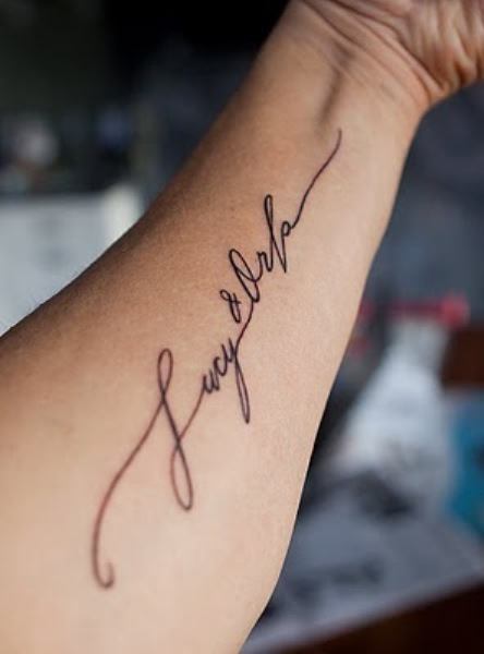 name tattoos on arm