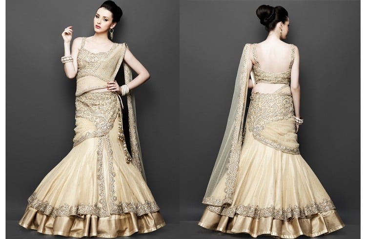 Multilayered gold lehenga Multilayered gold lehenga