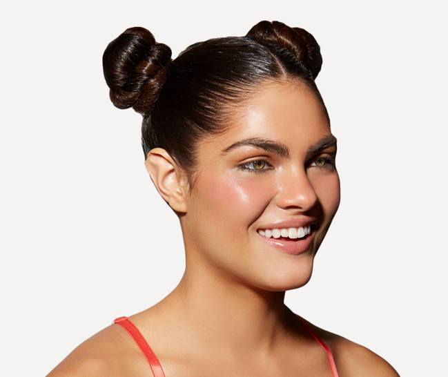 chignon twin buns hairstyle for gym