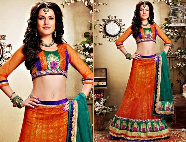 bewitching orange net lehenga choli