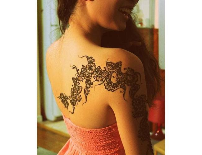 tattoo patterns on open back dress