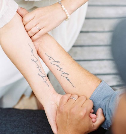 Cool His And Her Arm Tattoo