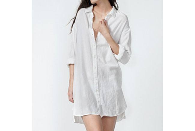 Oversized button-down shirts as a bathing suit cover up