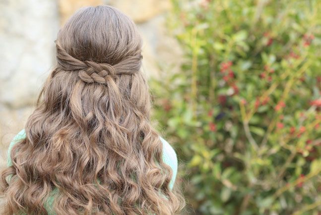 Knotted hairstyle with a bow