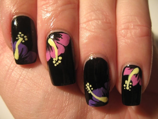 black nails with hibiscus flowers