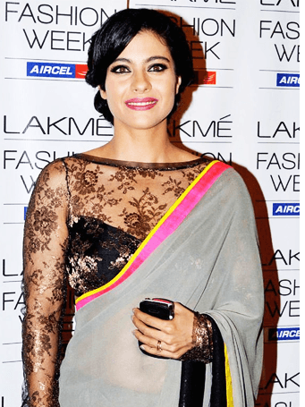Kajol in a boat neck blouse teamed up with a grey saree Kajol in a boat neck blouse teamed up with a grey saree
