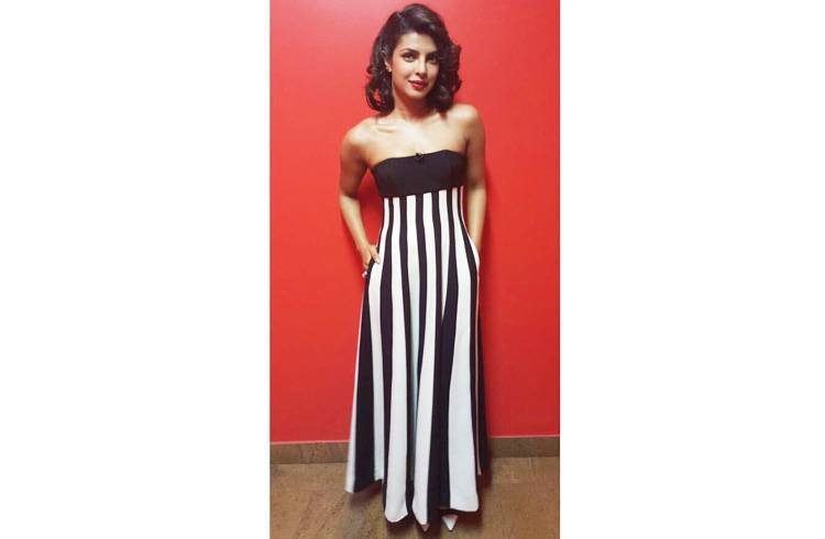 Priyanka Chopra was cute in a striped Dior gown and Zara pumps at Anupam Kher Show