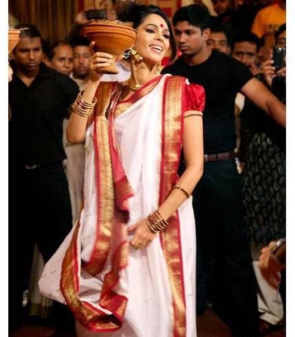 Mallika Sherawat in a traditional Bengali Saree
