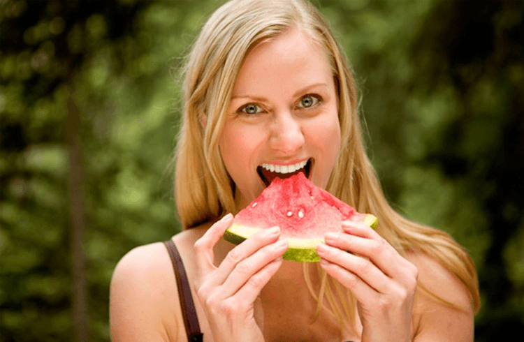 woman eating watermelon