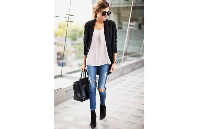 Camisole top and ripped jeans