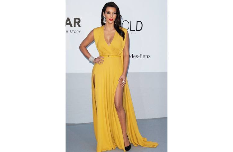 Kim in yellow slit gown