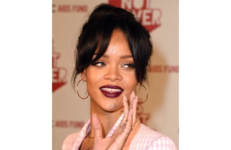 Rihanna pouts