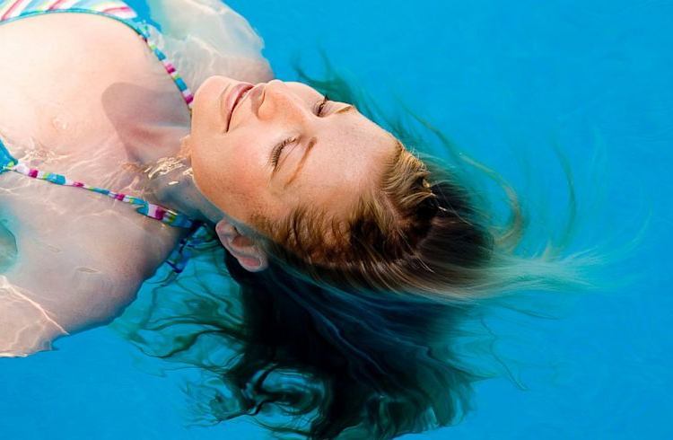 Woman swimming pool