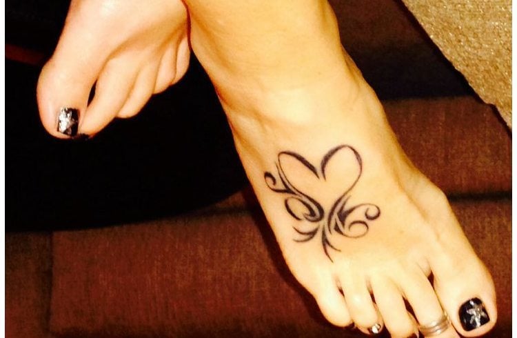 Heart tattoo on foot