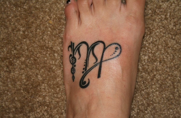 Zodiac foot tattoo