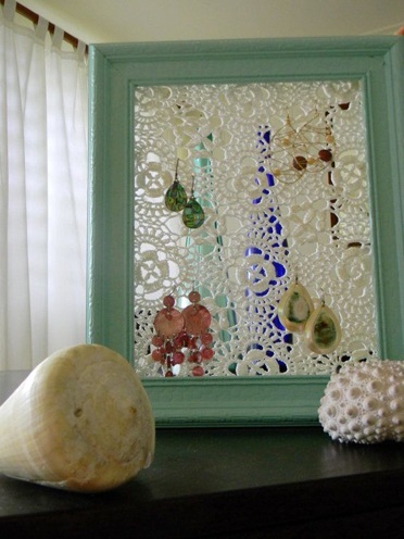 golden framed earring holder