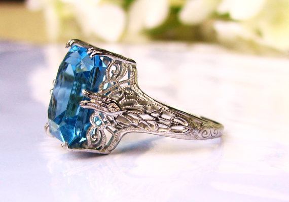 Sapphire and emerald engagement ring