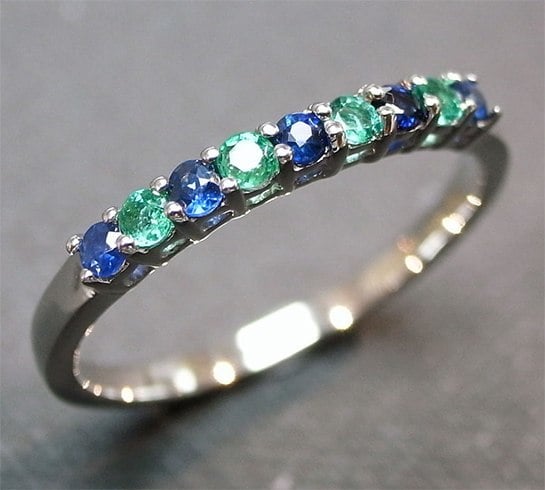Sapphire and emerald engagement rings