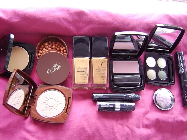 Picture of various Avon makeup products. Such as foundation, blush, shadow, and lip liner