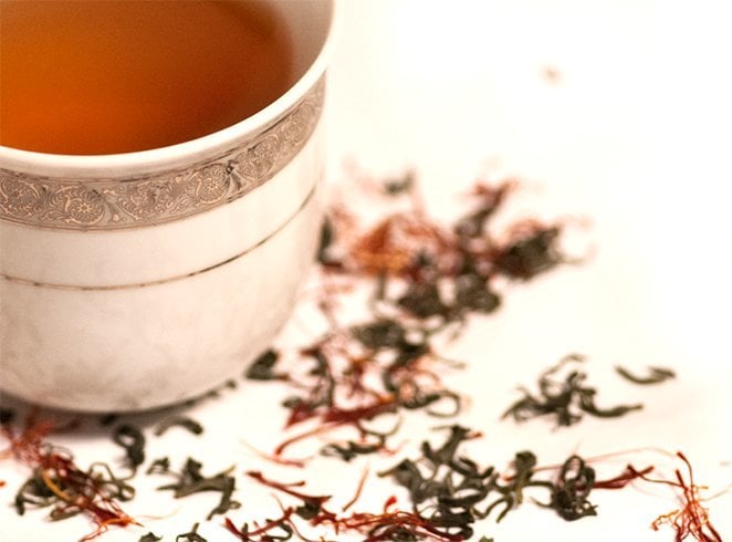 Green tea leaves and saffron tea