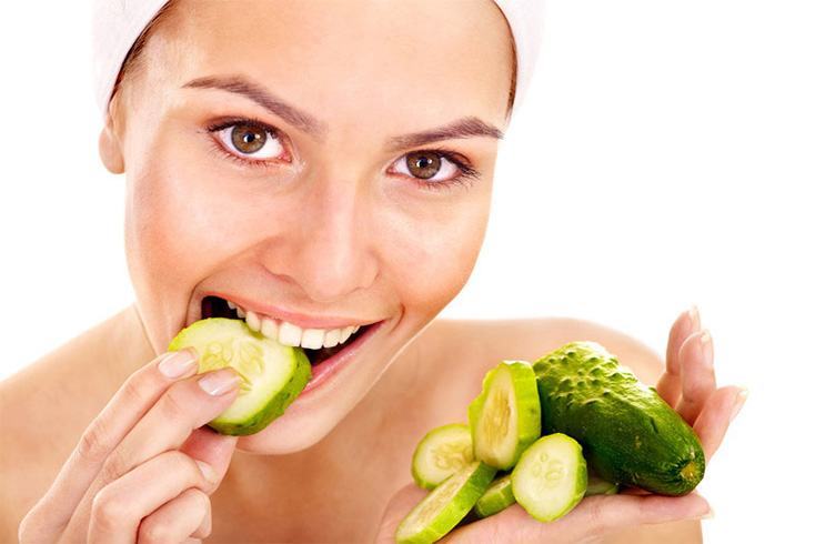 Women eating cucumber