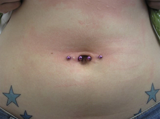 Horizontal Navel Piercing