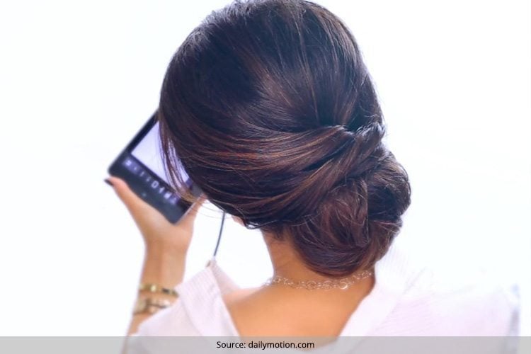 Messy bun styled for South Indian bride           bunstyles  newtrends bridalmakeup updo lowbun  South indian bride Indian bride  Bridal hair buns