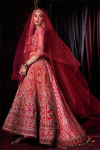 Tarun Tahiliani red ehenga with zardosi embroidery