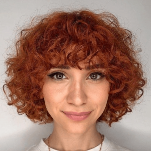 Short Curly Hairstyle With Bangs