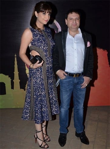 Michelle Poonawala with husband