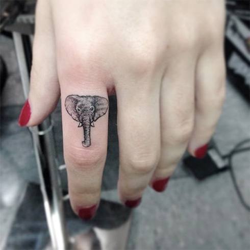 small finger tattoos