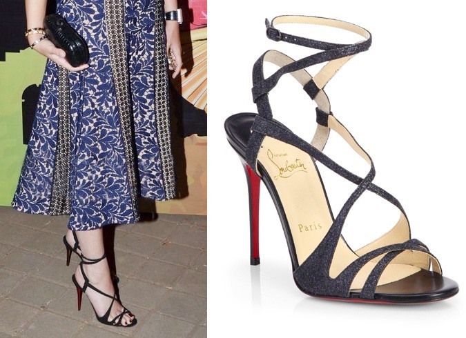 Michelle wore strappy black Louboutin