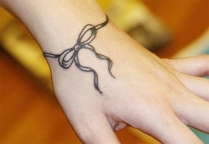Bow Tattoo on Wrist Bow Tattoo on Wrist