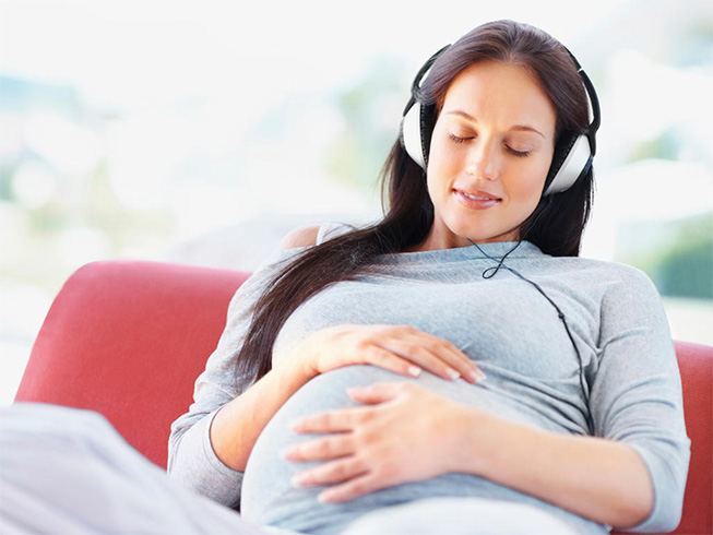 Pregnant women listening to music