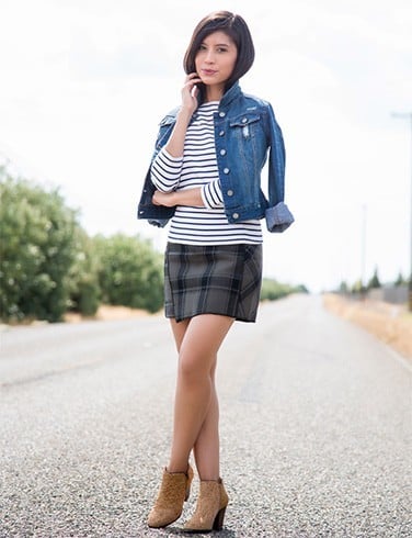 Denim jacket and plaid skirt