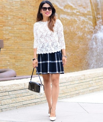 Lace top with plaid skirt