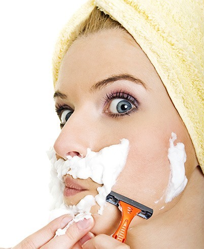 Woman shaving