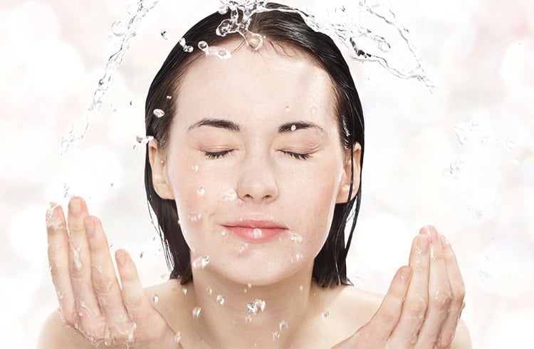 Washing Face With Ice Cold Water