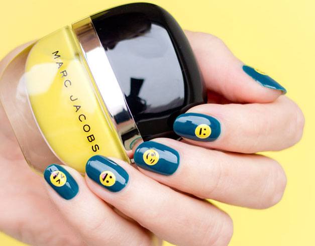 Blue background Emoji Nail Art.