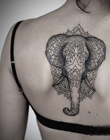 Elephant Tattoo On Spine
