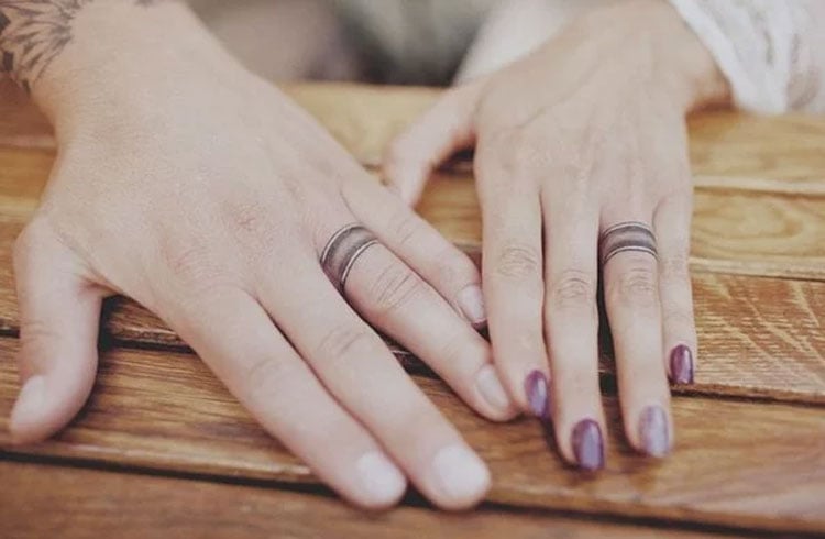 Unique Ring Finger Initial Tattoo Designs - wide 2