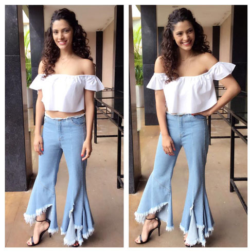 Saiyami Kher looking chic in her frayed hi-waist flared denim.