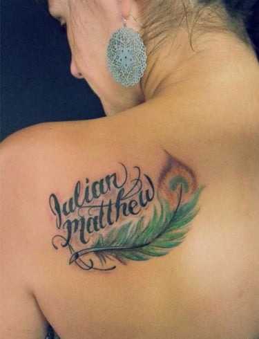 Feather With Names tattoo