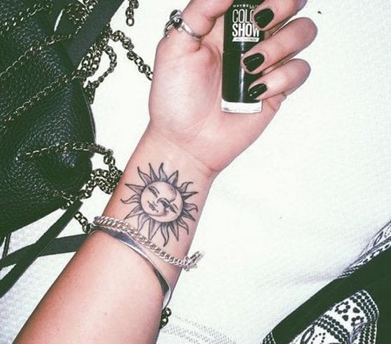 Sun and moon wrist tattoo