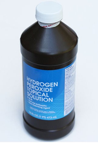 A bottle of 3 percent Hydrogen Peroxide for How to get water in of ears