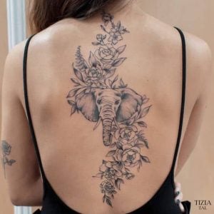 Elephant Tattoo On Spine
