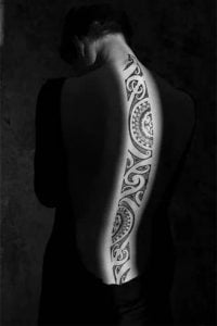 Long Tribal Tattoo On Spine