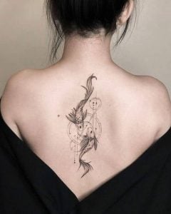 Small Geometric Tattoo On Spine